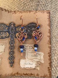 Deep Blue Lapis lazuli and Sky Blue Cat's Eye Glass playfully Dangle from the Handcrafted Beaded Copper Heart French Wire Earrings