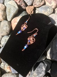 Deep Blue Lapis lazuli and Sky Blue Cat's Eye Glass playfully Dangle from the Handcrafted Beaded Copper Heart French Wire Earrings