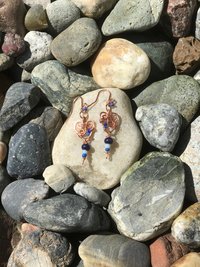 Deep Blue Lapis lazuli and Sky Blue Cat's Eye Glass playfully Dangle from the Handcrafted Beaded Copper Heart French Wire Earrings
