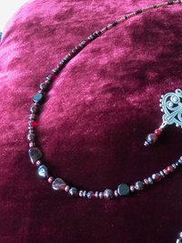 Dark and Alluring Garnet, Hematite, Faceted Glass and Bead Necklace with Pressed Metal Chandelier and Garnet Dangle Earring Set