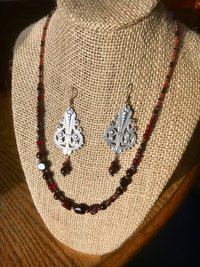 Dark and Alluring Garnet, Hematite, Faceted Glass and Bead Necklace with Pressed Metal Chandelier and Garnet Dangle Earring Set