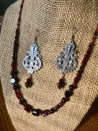 Dark and Alluring Garnet, Hematite, Faceted Glass and Bead Necklace with Pressed Metal Chandelier and Garnet Dangle Earring Set