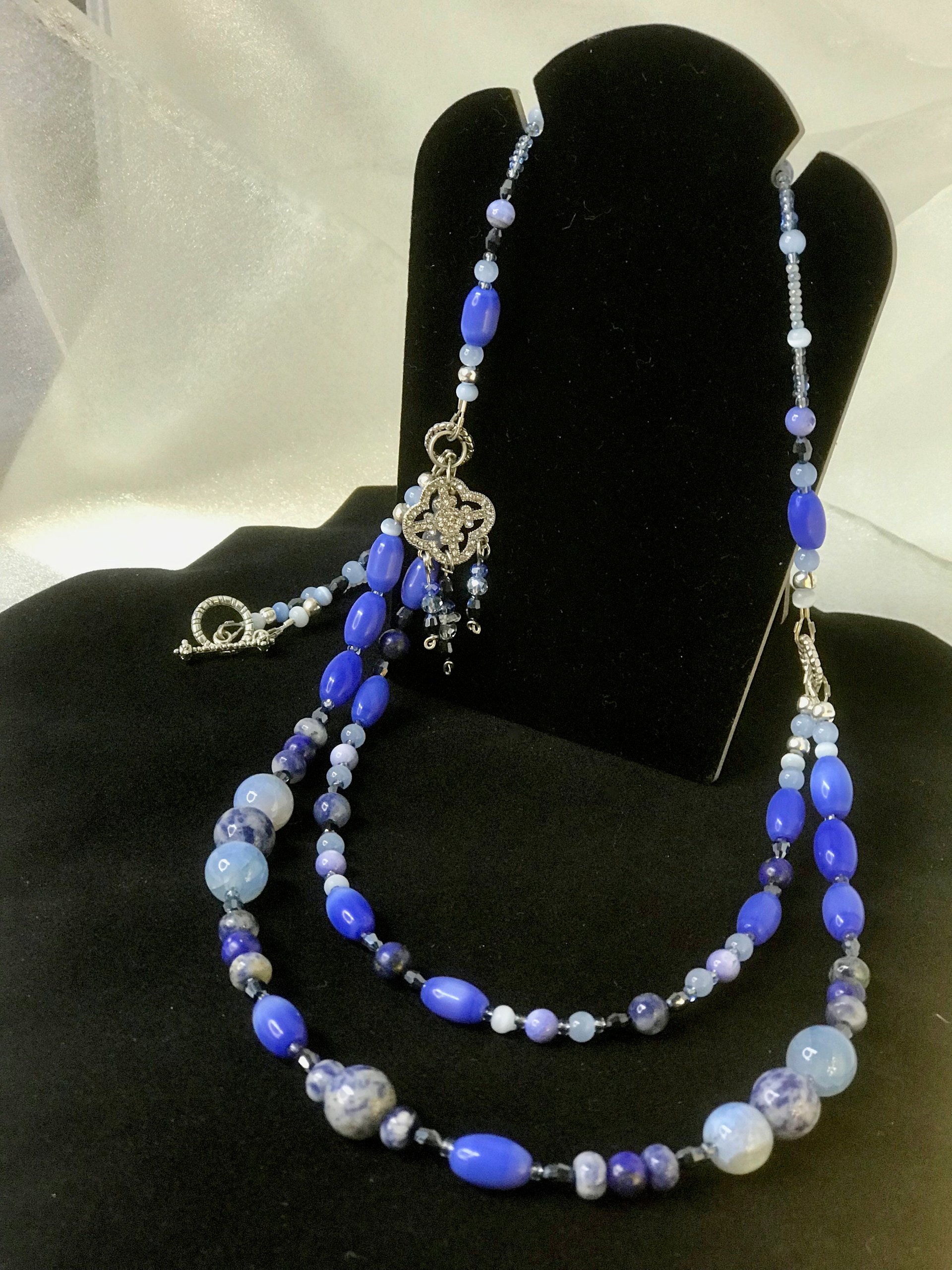 Summers Evening Shimmering Charm Necklace in Blue Shades of Crackle Agate, Sodalite, Lapis, Mother of Pearl, Cat's Eye, Faceted Glass Beads