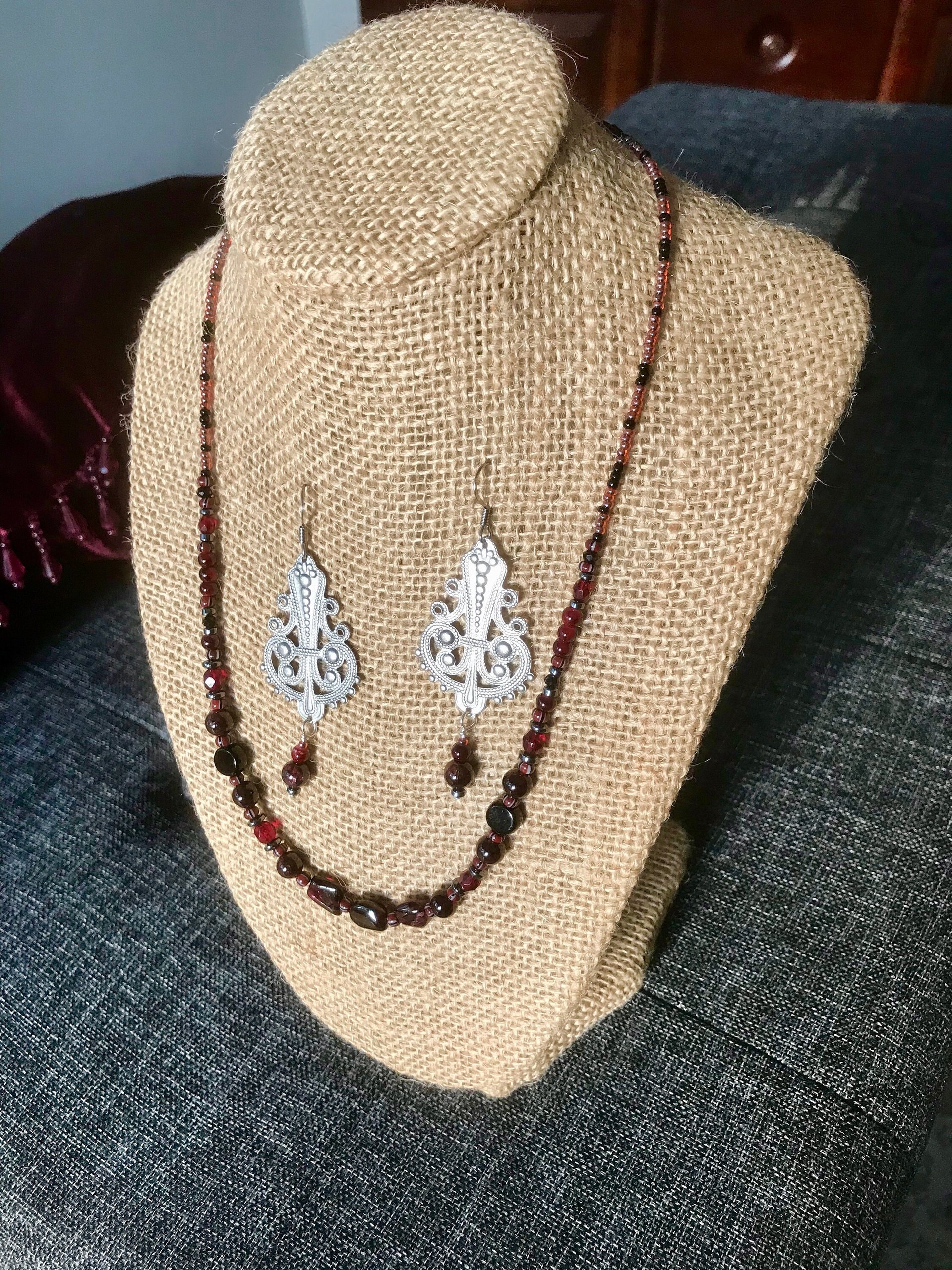 Dark and Alluring Garnet, Hematite, Faceted Glass and Bead Necklace with Pressed Metal Chandelier and Garnet Dangle Earring Set