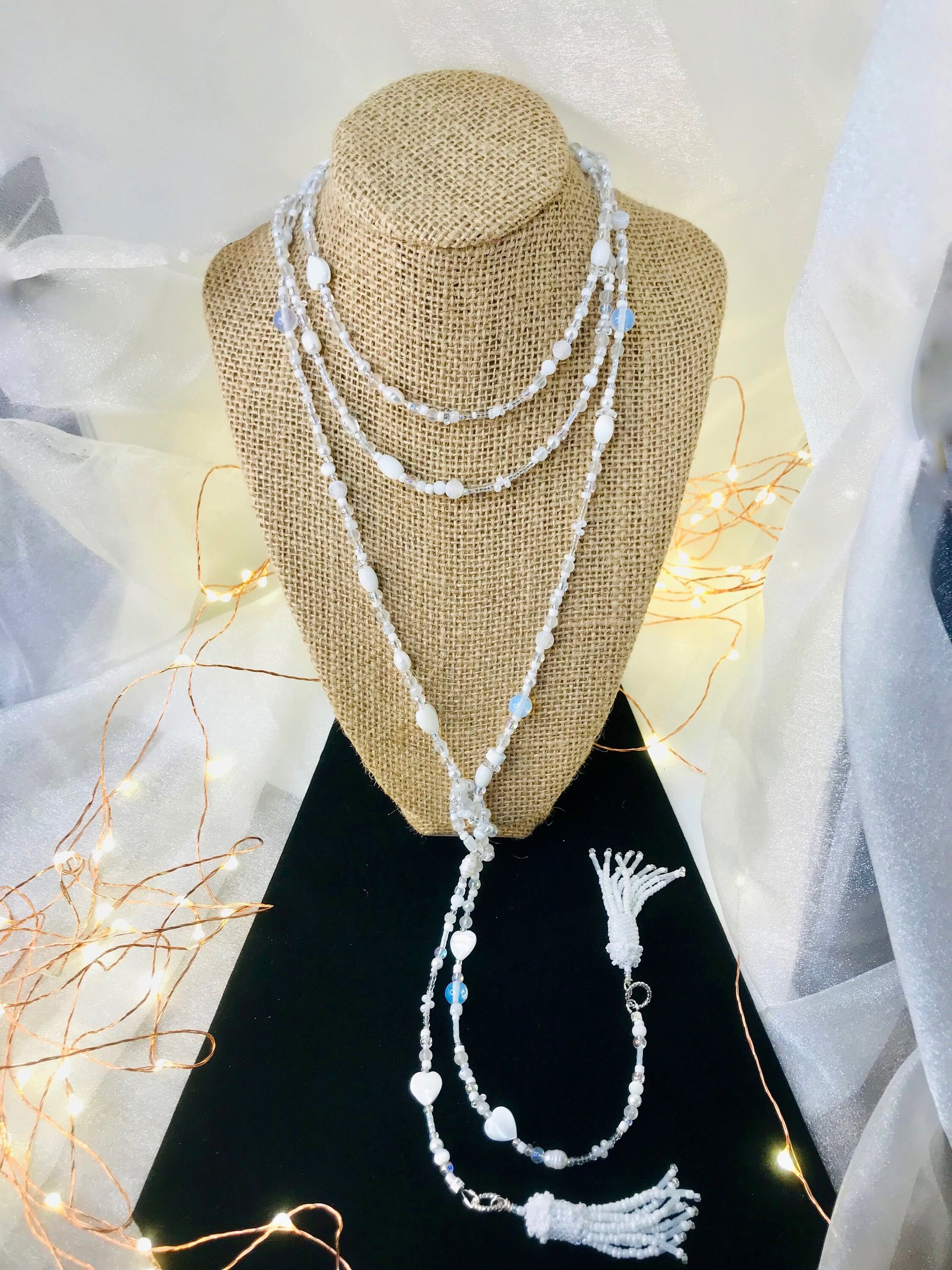 Lovely White and Iridescent Handmade Beaded Lariat Rope Multi-Style Tassel Necklace with Mother of Pearl Heart, Moonstone, Faceted Crystal