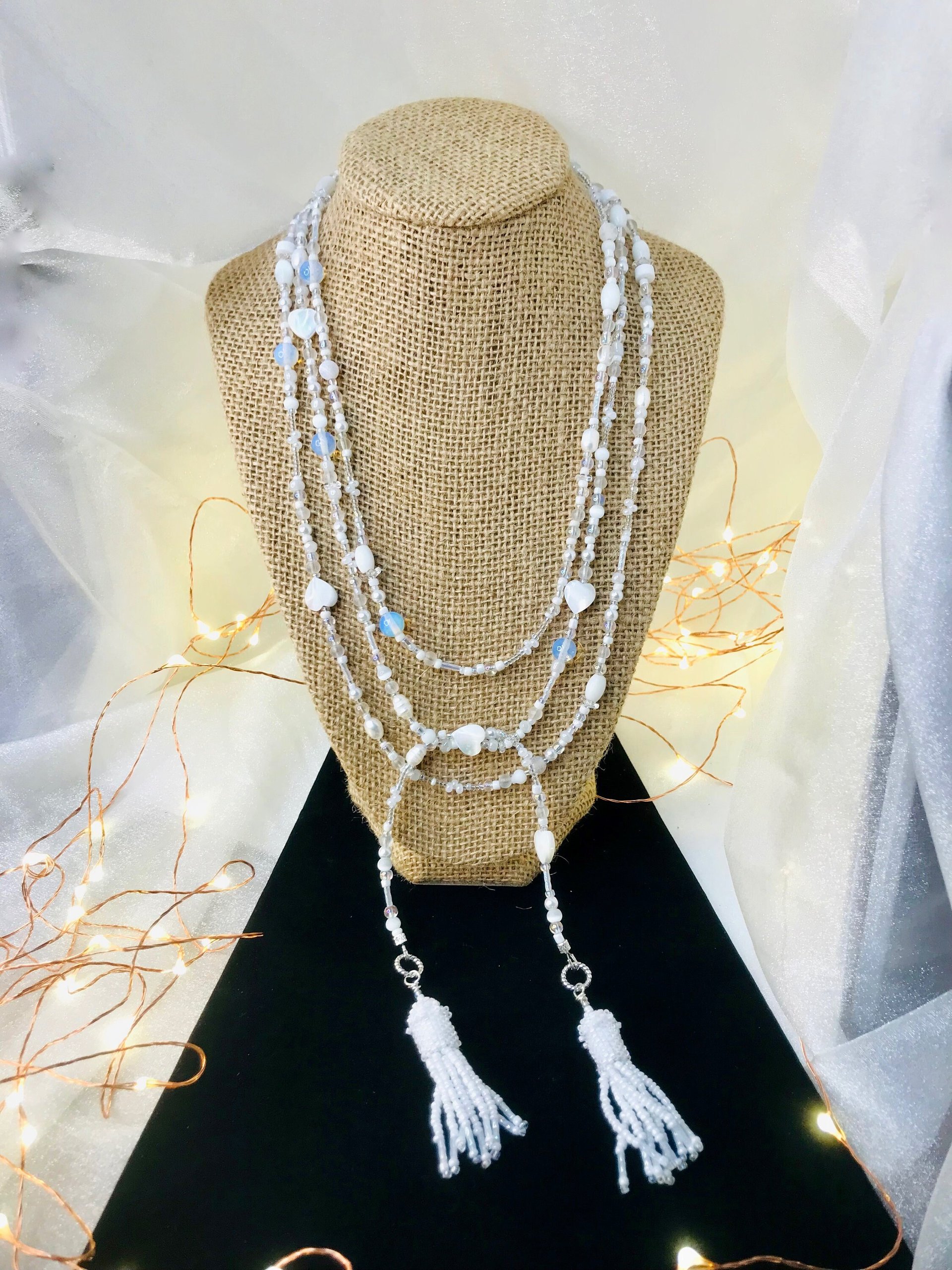 Lovely White and Iridescent Handmade Beaded Lariat Rope Multi-Style Tassel Necklace with Mother of Pearl Heart, Moonstone, Faceted Crystal