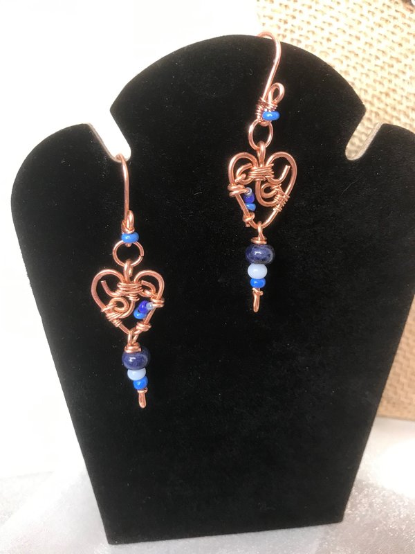 Deep Blue Lapis lazuli and Sky Blue Cat's Eye Glass playfully Dangle from the Handcrafted Beaded Copper Heart French Wire Earrings